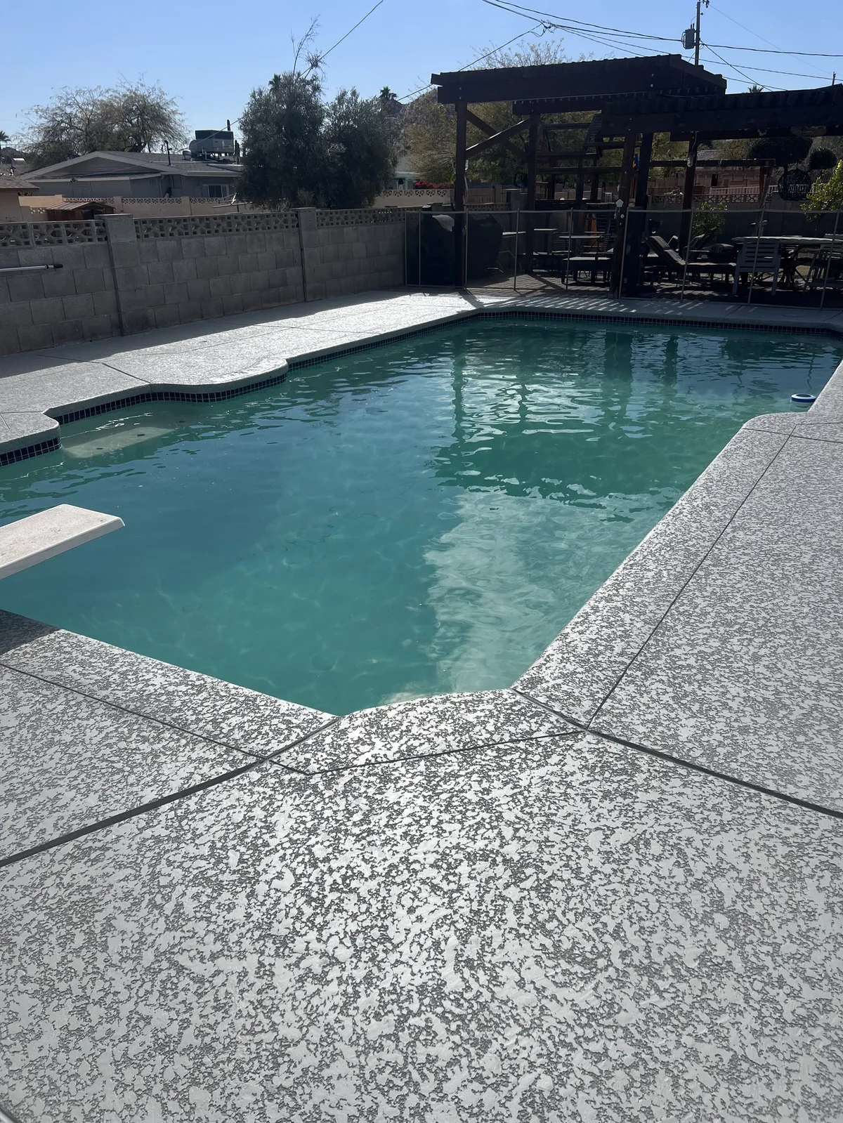 Pool deck repair and resurfacing showing textured cool deck finish Phoenix