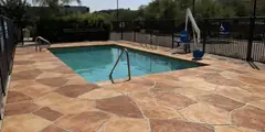 Decorative stamped overlay pool deck resurfacing with tile pattern Arizona